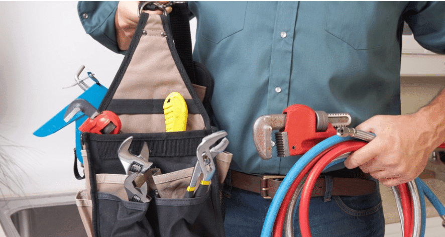 plumber with tools, ready to inspect plumbing