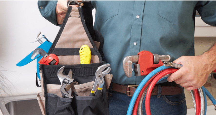plumber with tools, ready to inspect plumbing